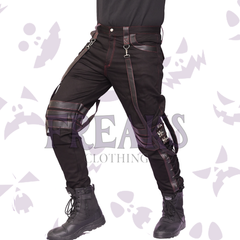 Black steampunk gothic pants with red stitching, leather straps, and metal buckles.