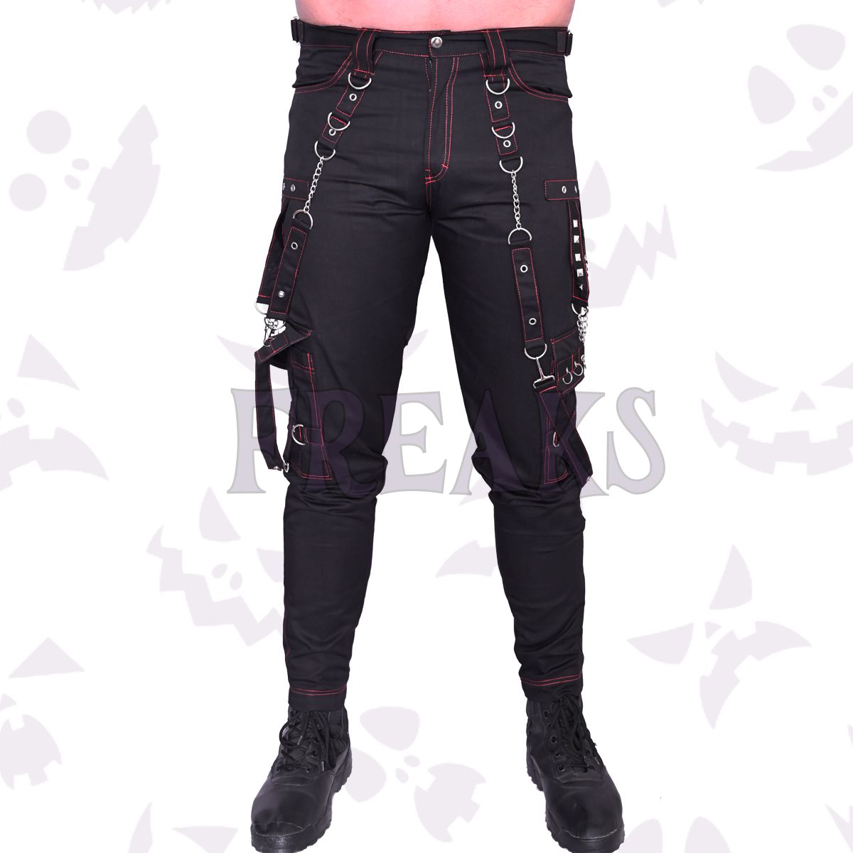 Black gothic pants with red stitching, silver chains, pyramid studs