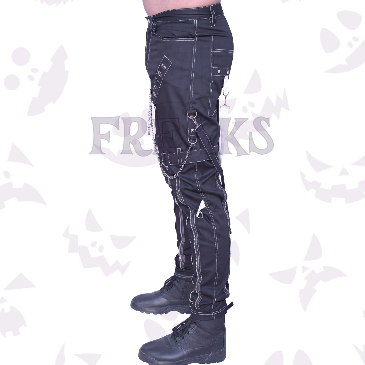 Side view of Men's Black punk gothic pants featuring contrast white stitching, studded straps, hanging chains, and zipper accents