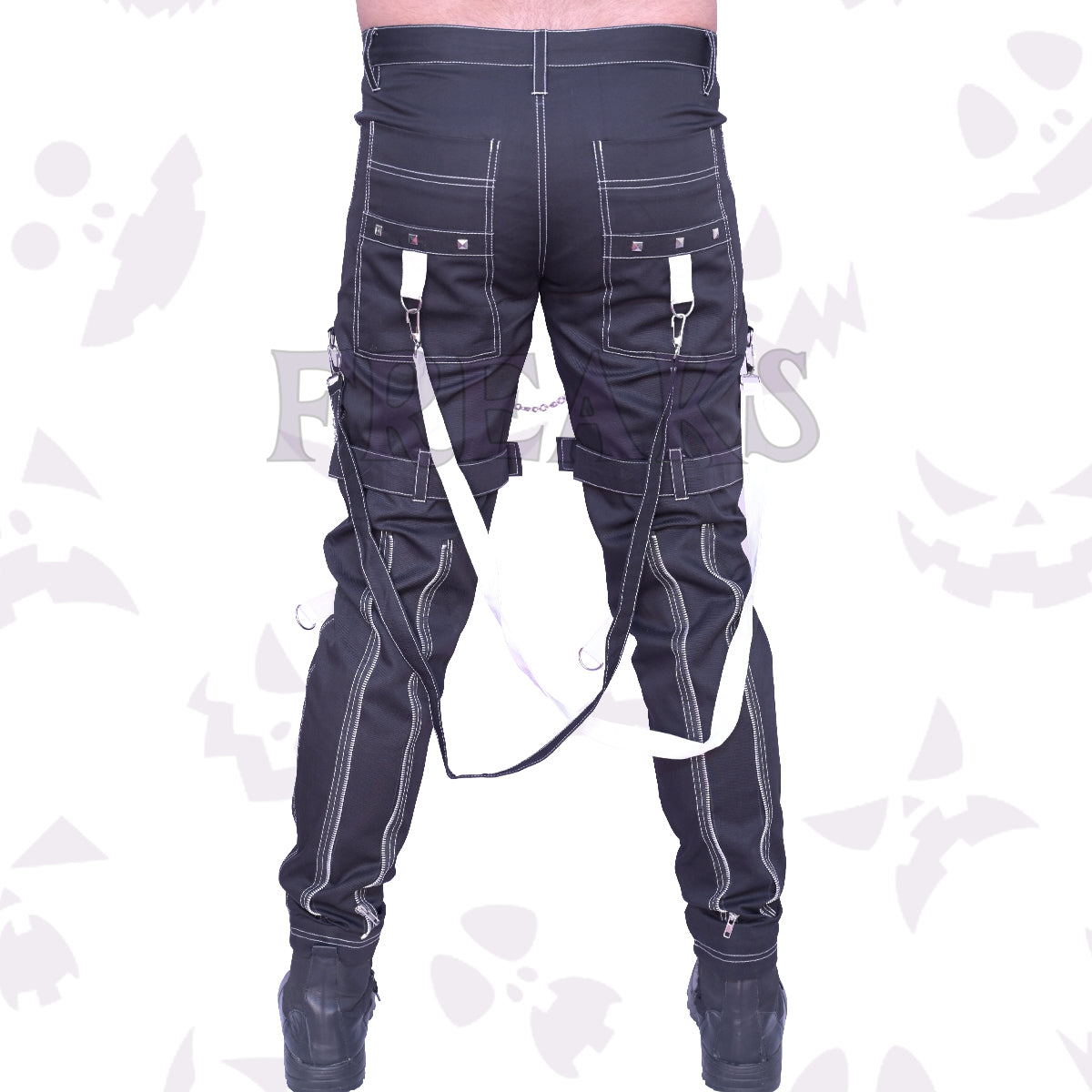 Back view of Men's Black punk gothic pants featuring contrast white stitching, studded straps, hanging chains, and zipper accents